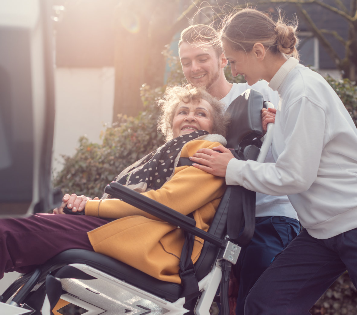 patient and the two adult smiling