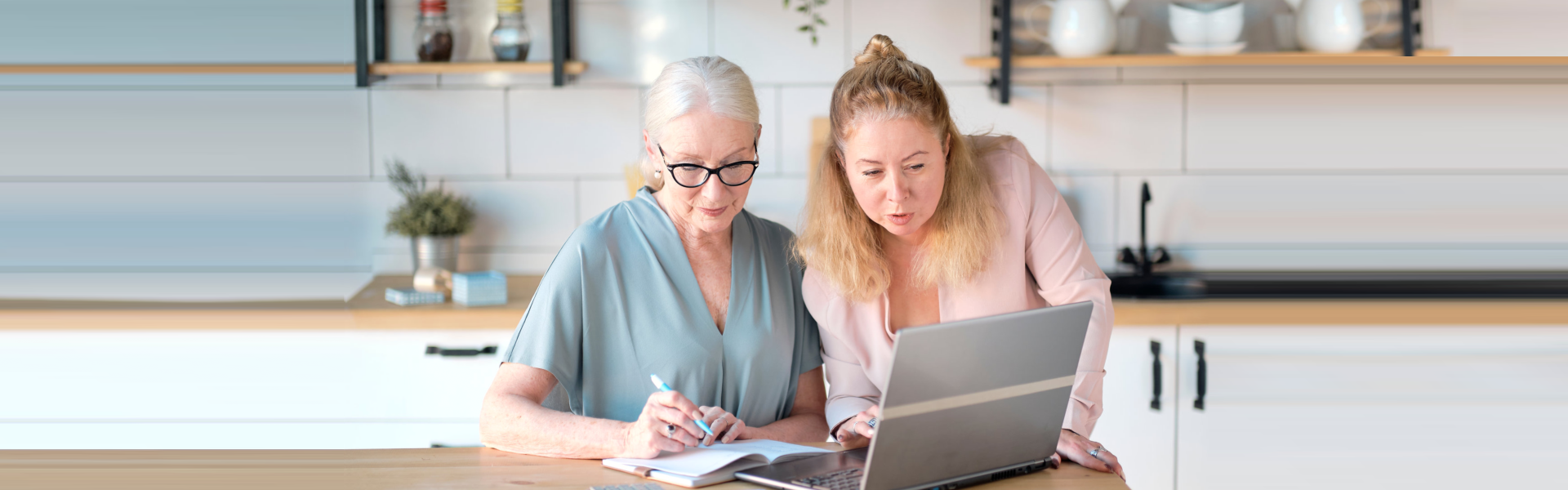 daughter helps her elderly mother figure it out online